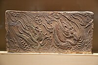 Winged xian flying in the heavens, Dengzhou painted stone-relief [zh], Liu Song dynasty.