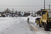 A major intersection in West Seneca, New York being cleared (Union Rd/NY 277 and Center Rd/NY 16) facing west toward Buffalo