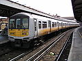 Class 319/0, no. 319013 "The Surrey Hills" at Clapham Junction