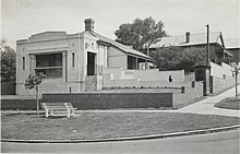 Photograph of a single storey stone building