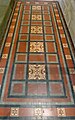 Encaustic tiles on chancel floor