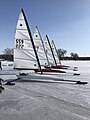 A line of Nite iceboats on Green Lake