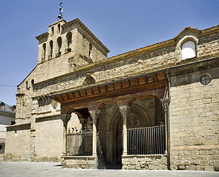 Jaca Cathedral, Spain, has the deep side porch and galleried tower found on many Spanish churches.