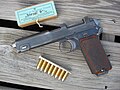 Steyr M1912 pistol with box and stripper clip of 9×23mm Steyr ammunition