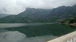 Azhiyar Dam amidst the Western Ghats near Pollachi