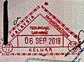 Malaysian passport exit stamp from Tedungan ICQS Checkpoint.