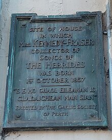 Bronze plaque on the site where Marjory Kennedy-Fraser was born on 1 October 1857, 60-62 High Street, Perth.