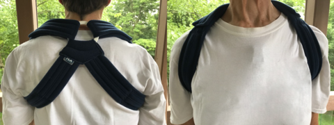 A cloth brace to hold the scapulas in retraction to reduce shoulder symptoms, such as collarbone pain