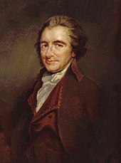 1/2 length portrait of Thomas Paine. He is turned towards the left and looking inquiringly out towards the viewer. He is wearing a dark red velvet jacket and a white shirt and there are papers next to him.