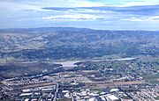 Anderson Reservoir, above Morgan Hill and San Jose, California, near capacity, two weeks after its overflow flooded neighborhoods in San Jose in 2017