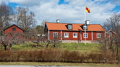 Bromma prästgård från år 1850 med Tiondeladan, Bromma kyrka tiondeladan till vänster närmast intill prästgården och sockenstugan till höger.