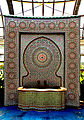 A traditional Moroccan fountain inside the conservatory