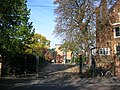 The rear entrance of St Hugh's College, at the northern end of Winchester Road at the junction with Canterbury Road.