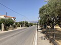 The main road in Tsoukaleika with Panachaiko in the background.