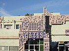 Part of the facade of the Aztec Hotel