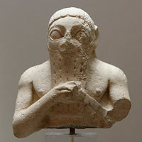 Male bust, perhaps Lugal-kisal-si, king of Uruk. Limestone, Early Dynastic III. From Adab (Bismaya).