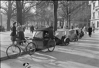 The pedi-cab, or bicycle taxi, was still in use in the spring of 1945 (Imperial War Museums, U.K.)