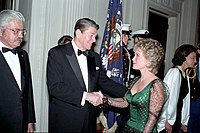 Barbara Mandrell shaking hands with President Ronald Reagan.