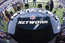 A round table of an open-air announcers' booth