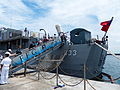 2013年中正軍港營區開放活動，遊客由鳳陽軍艦左舷後方舷梯登艦，留意艦尾的美國海軍時代舊名。