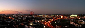 Skyline of Wolfsburg at dusk.