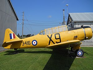 side view of restored single engine military aircraft