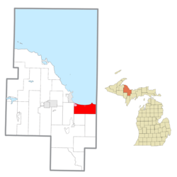 Location within Marquette County (red) and the administered community of Harvey (pink)