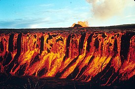A cascade of molten lava flowing into Aloi Crater during the 1969–1971 Mauna Ulu eruption of Kilauea volcano