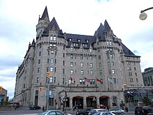 Exterior photo of south entrance of a hotel constructed in French gothic revival châteauesque architecture