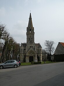 Photo d'une église de style gothique surmontée d'un clocher.