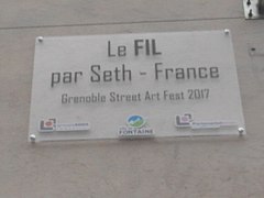 Plaque sous le fresque de Seth, à Fontaine, apposée en 2017.