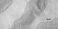 Close view of crater with regions of latitude dependent mantle, as seen by HiRISE under HiWish program