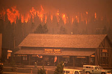 North Fork fire is seen spreading towards buildings in the Old Faithful area on September 7. 1988