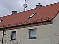 Waloschek-Haus mit typischem Backstein-Sims