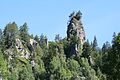 The rocky outcropping above the village