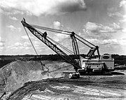 Big Muskie was built in 1969 as the world's largest ever dragline excavator, being 487 ft (148 m) in length, weighing 13,500 short tons (12,247 t), and hoisting a 220 cu yd (168.2 m3) bucket that could move 325 short tons (295 t) of material at a pass. Its top speed was 0.1 miles per hour (0.16 km/h).