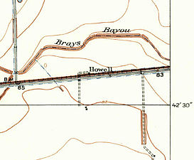Howell is on a 1915 USGS map. The railroad is identified as the San Antonio and Aransas Pass while the road going north from the 85' benchmark (BM) is Addicks Road.