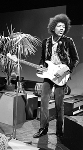 1967 photograph of a Stratocaster (played by Jimi Hendrix) with large "CBS" headstock
