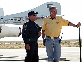 Mike Melvill and Burt Rutan speak to the media after the first flight into space