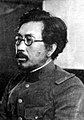 陸軍軍医少佐ないし陸軍三等軍医正（少佐相当官）。1932年当時の石井四郎