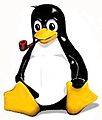 Tux, with pipe and tuft of hair, as Slackware's mascot.