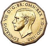 Brass coin showing bust of a man