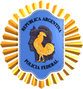 La silueta de la Libertad de Oudiné integra el escudo de la Policía Federal Argentina.