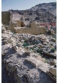 1985 photo of a portion of Ganden Monastery ruins (with some new buildings) destroyed by the People's Liberation Army in 1959, after Tibetan's March 10th Lhasa protest and the flight to exile of the 14th Dalai Lama of Tibet.