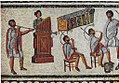 Image 54Musicians playing a Roman tuba, a water organ (hydraulis), and a pair of cornua, detail from the Zliten mosaic, 2nd century AD (from Culture of ancient Rome)