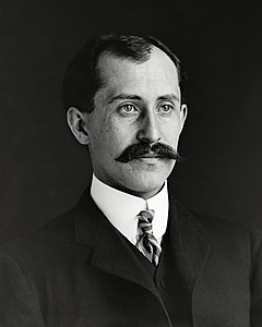 Orville Wright at Wright brothers, by Wilbur Wright (restored by Scewing and Bammesk)