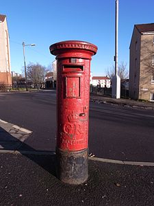 King George V post box by Carron Company. Glasgow, Arden, Kilmuir Crescent.