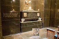 The graves of Emperor Pedro I of Brazil (also King of Portugal as Pedro IV) and his two wives Maria Leopoldina (not pictured, facing his grave) and Amélie (left), in the Monument to the Independence of Brazil, are made of green granite. The walls as well as the floor are clad with the same material.[79]