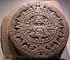 Aztec calendar stone; 1502–1521; basalt; diameter: 358 cm (141 in.); thick: 98 cm (39 in.); discovered on 17 December 1790 during repairs on the Mexico City Cathedral; National Museum of Anthropology (Mexico City). The exact purpose and meaning of the Calendar Stone are unclear. Archaeologists and historians have proposed numerous theories, and it is likely that there are several aspects to its interpretation[40]