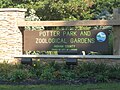 Potter Park and Zoological Gardens sign along the entrance drive to the zoo